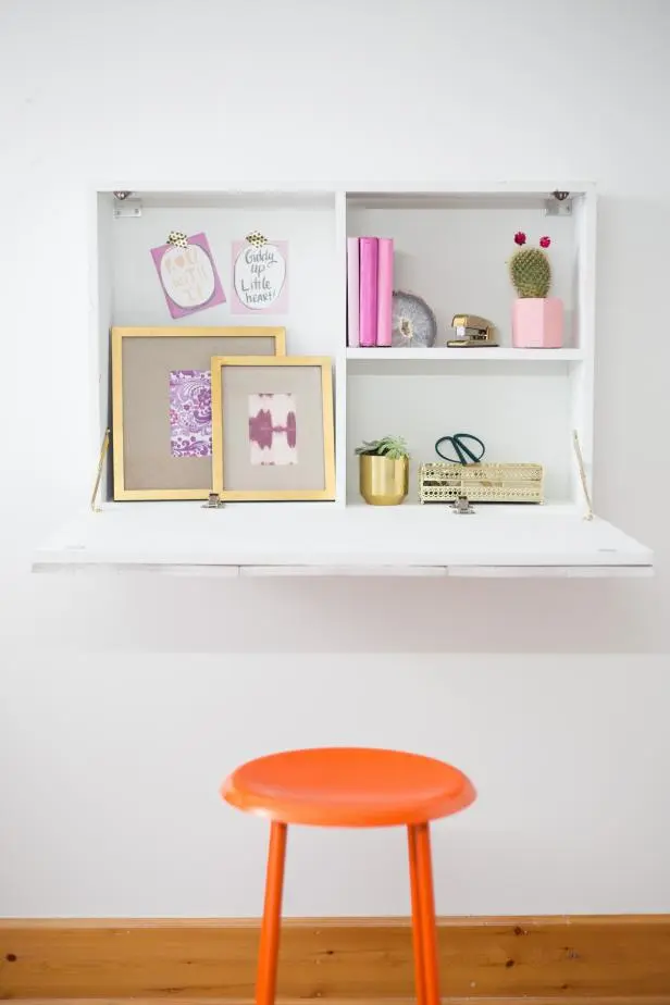 white space saving fold up desk for creating a home office in a small space