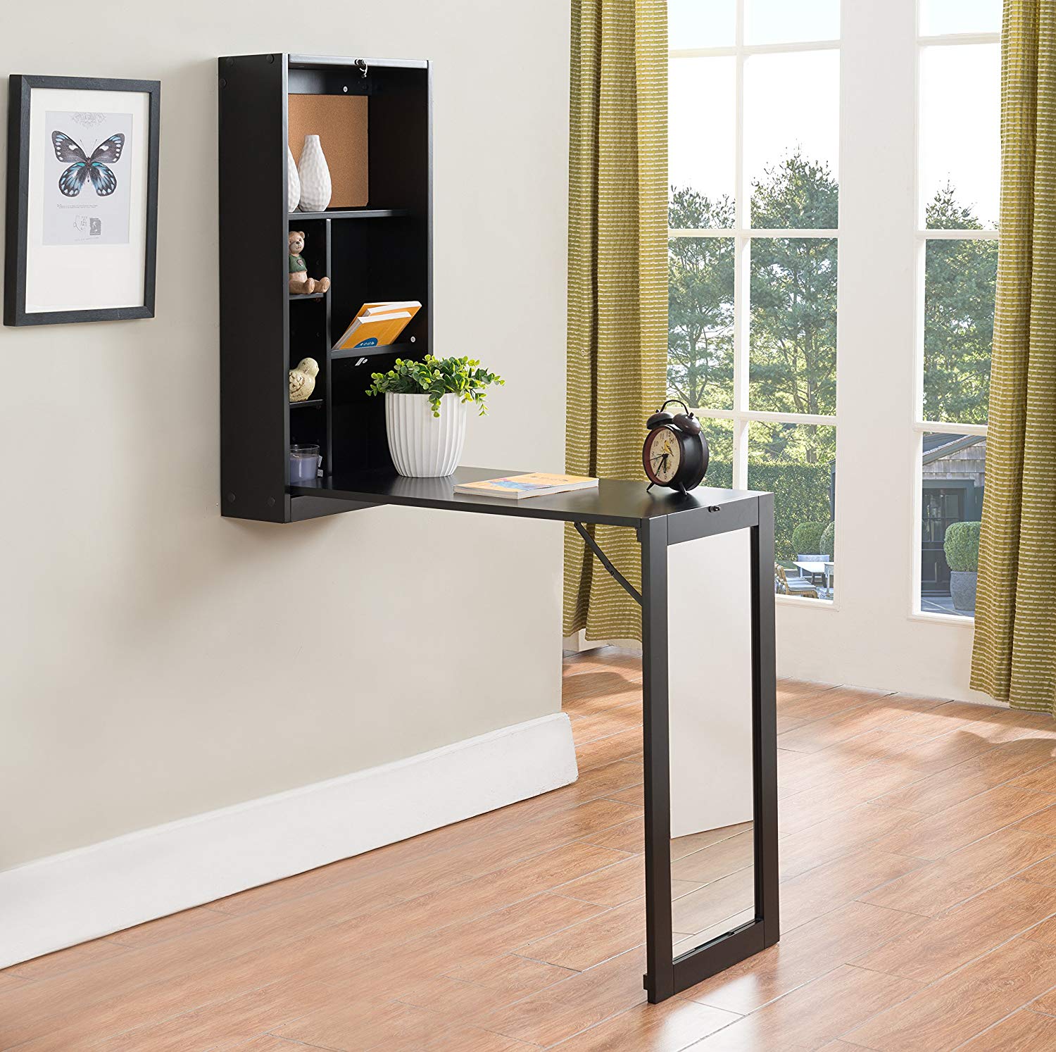 fold up desk used for creating a home office in a small space