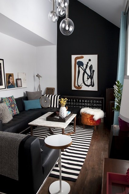 black accent wall in small living room
