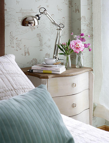 use wallpaper to separate space in a studio apartment 