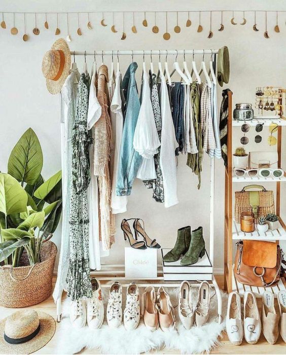 stylish clothing rack and wooden shelf for a makeshift closet