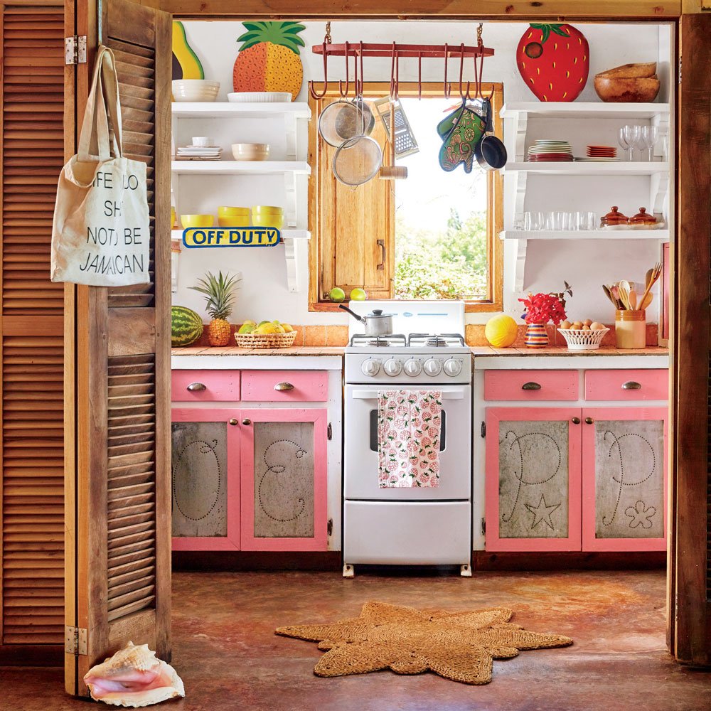 colorful tropical small kitchen with pink cabinets