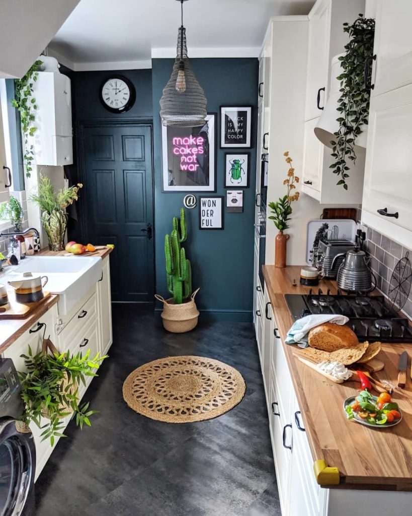 bold dark blue accent wall in small kitchen