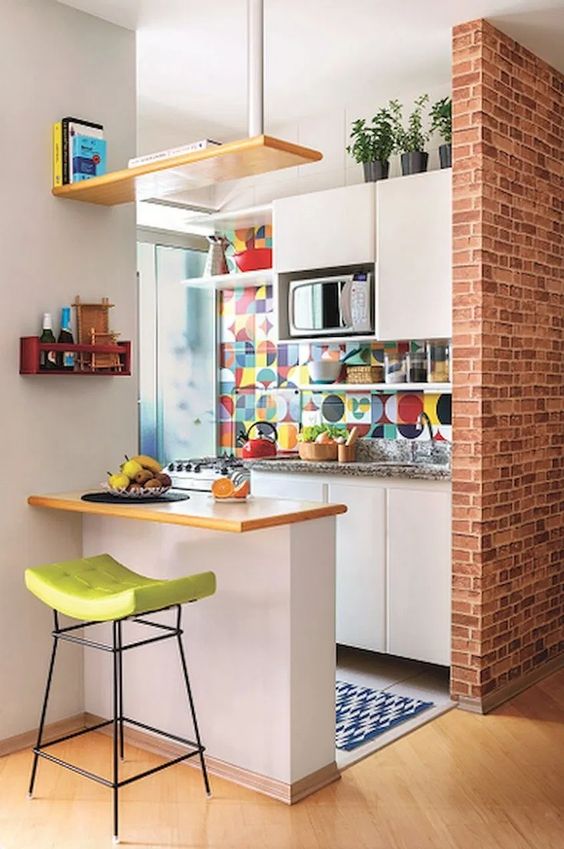 bold colorful backslash tile in small kitchen