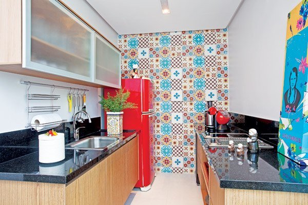 bold colorful accent wall in small kitchen 