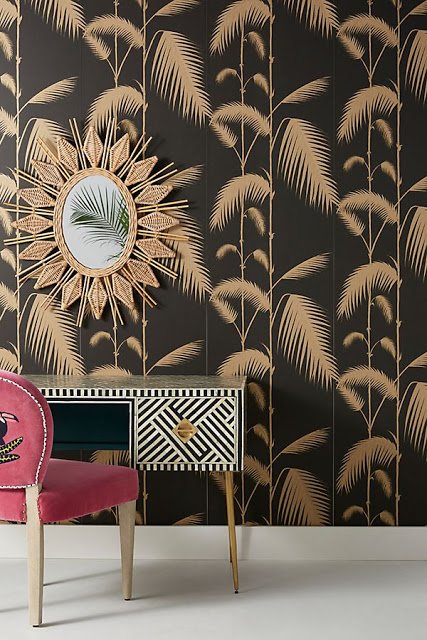 black and gold palm leaves wallpaper in small room