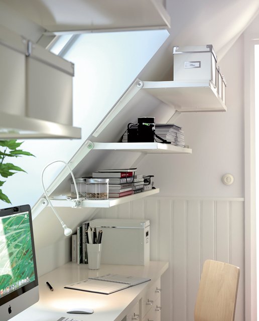 small corner office nook with shelves