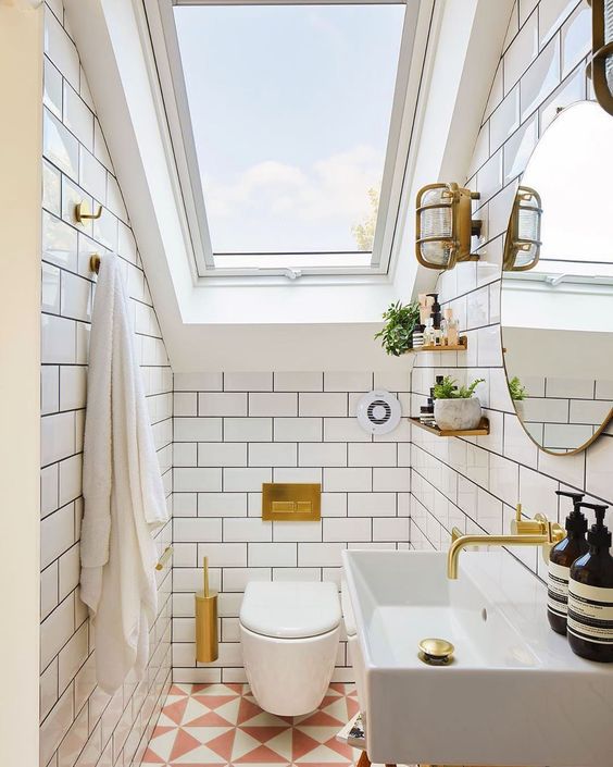 bright white and gold small bathroom