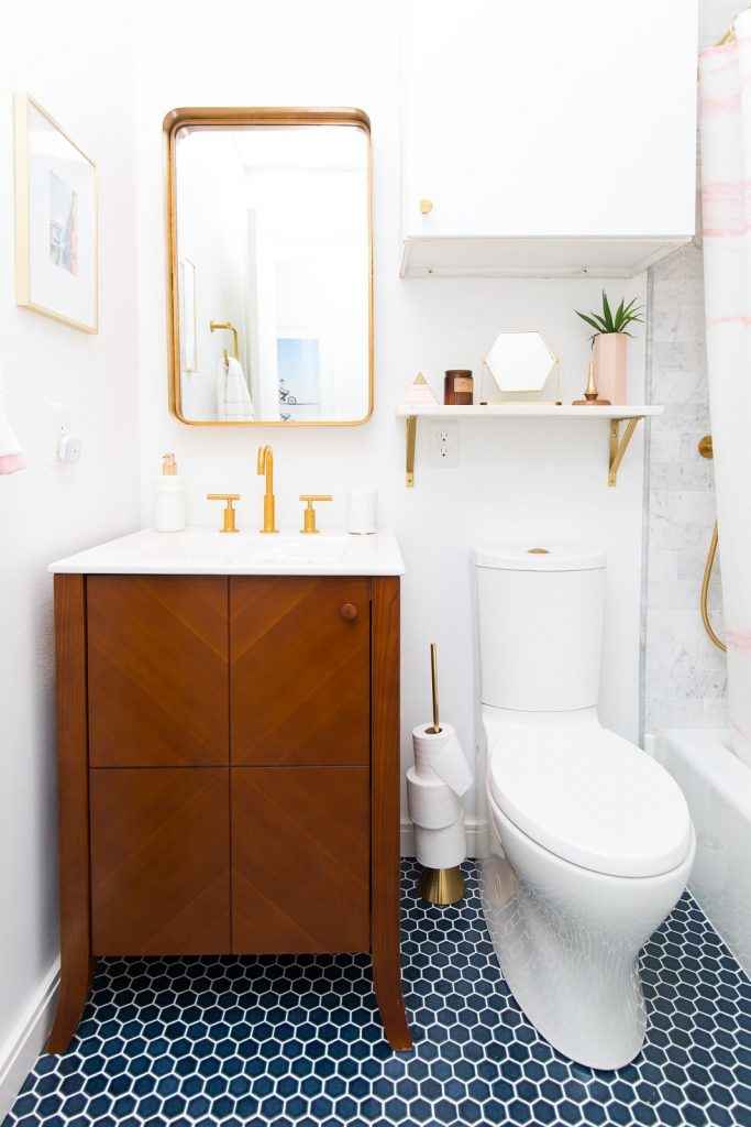 bright white and gold small bathroom decor