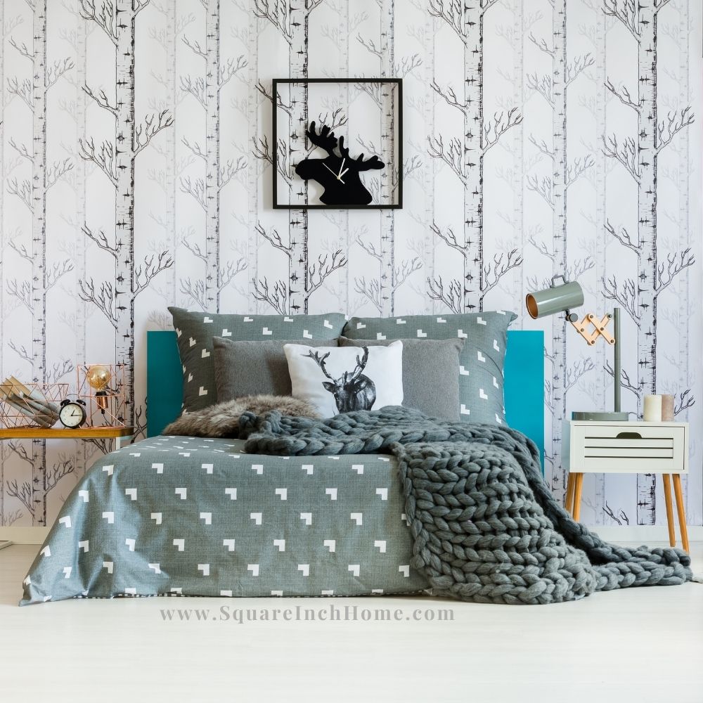 tree trunk stripe wallpaper in small bedroom