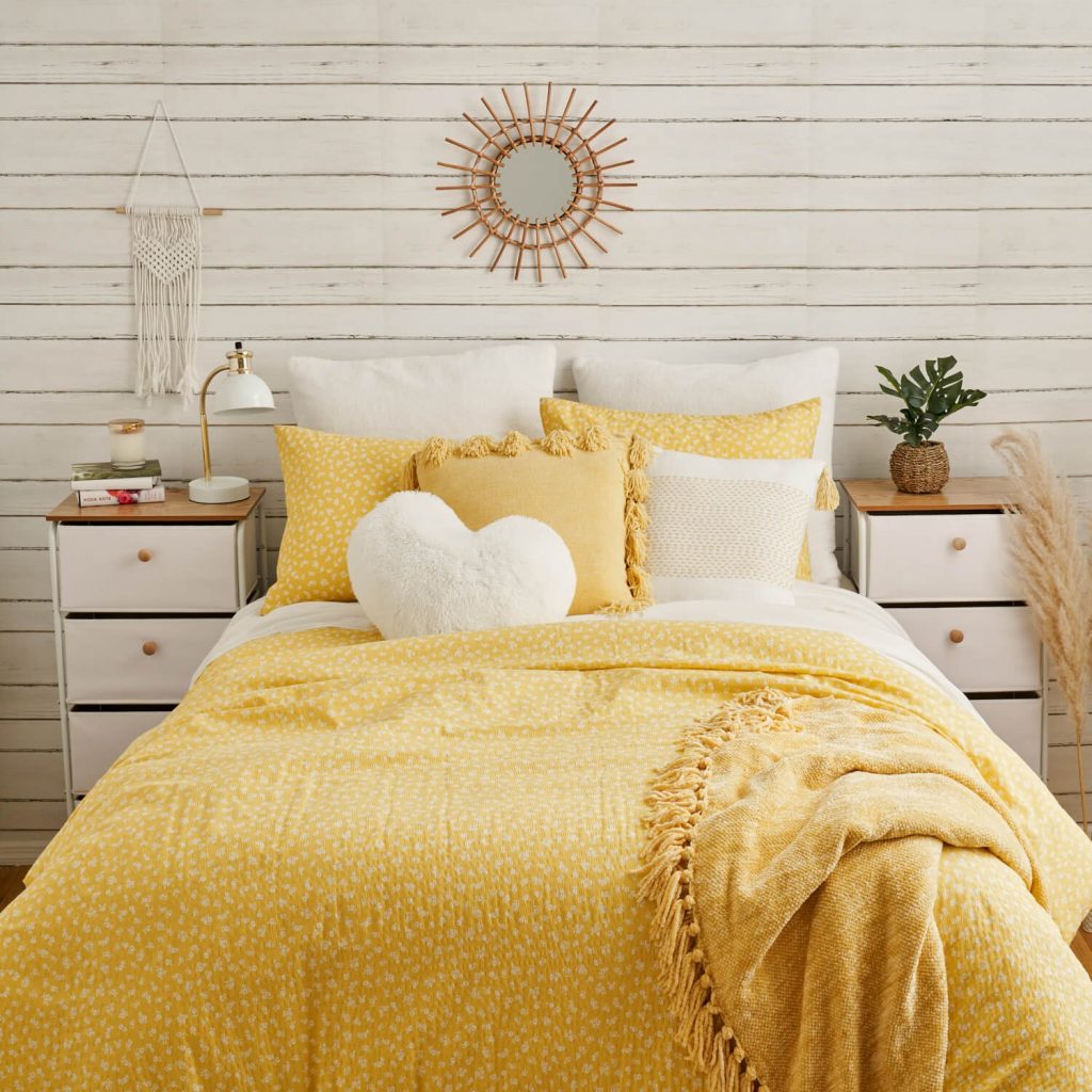 sunny yellow and white dorm room