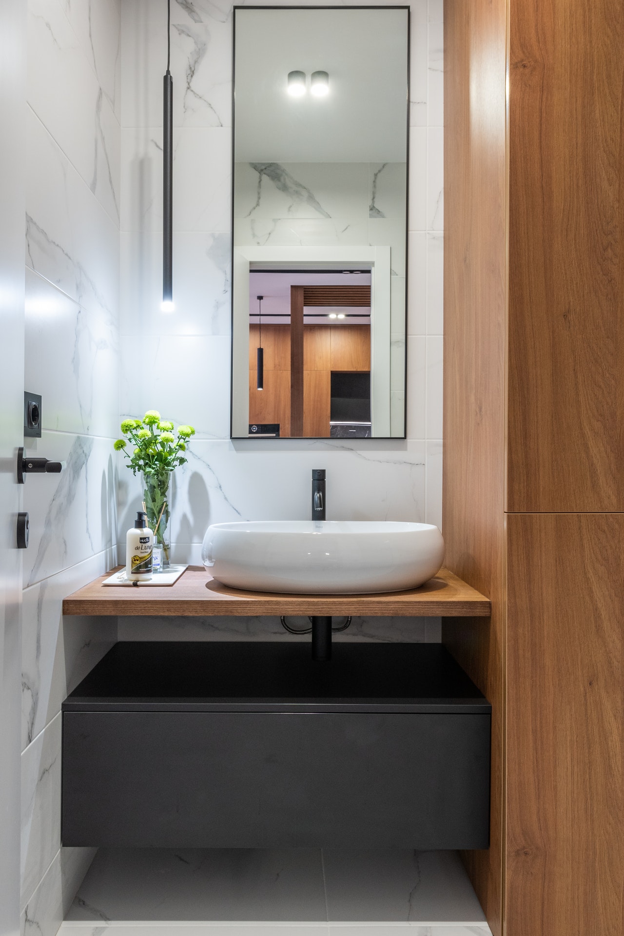 mirror placement in small bathroom