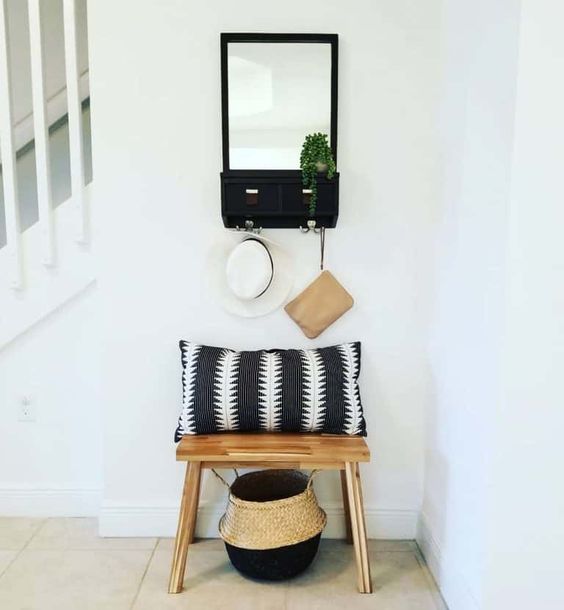 small entryway with stool