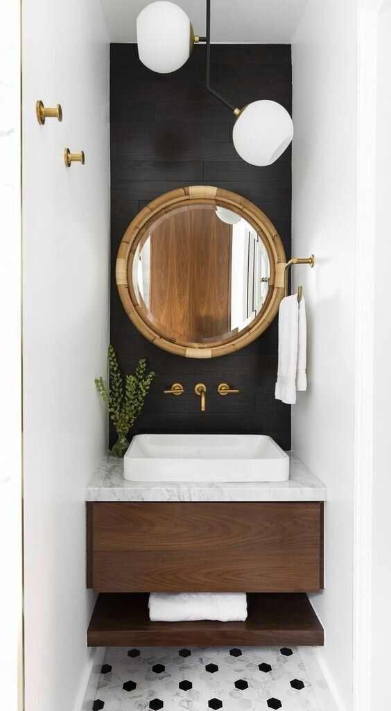 black accent wall in powder room