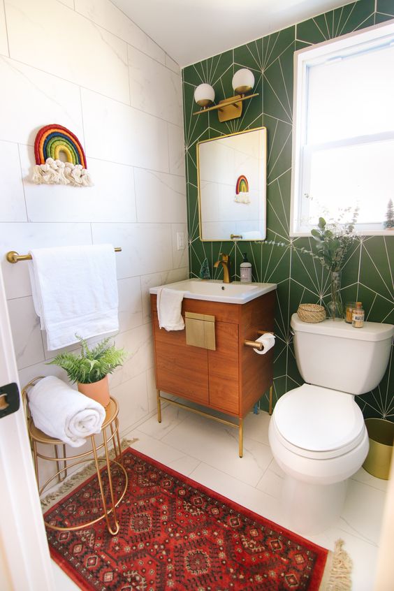green geometric feature wall in bathroom